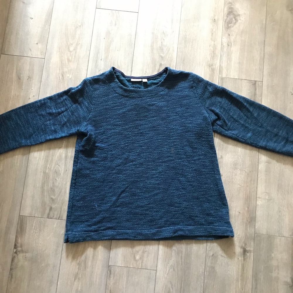 bluish-green sweater